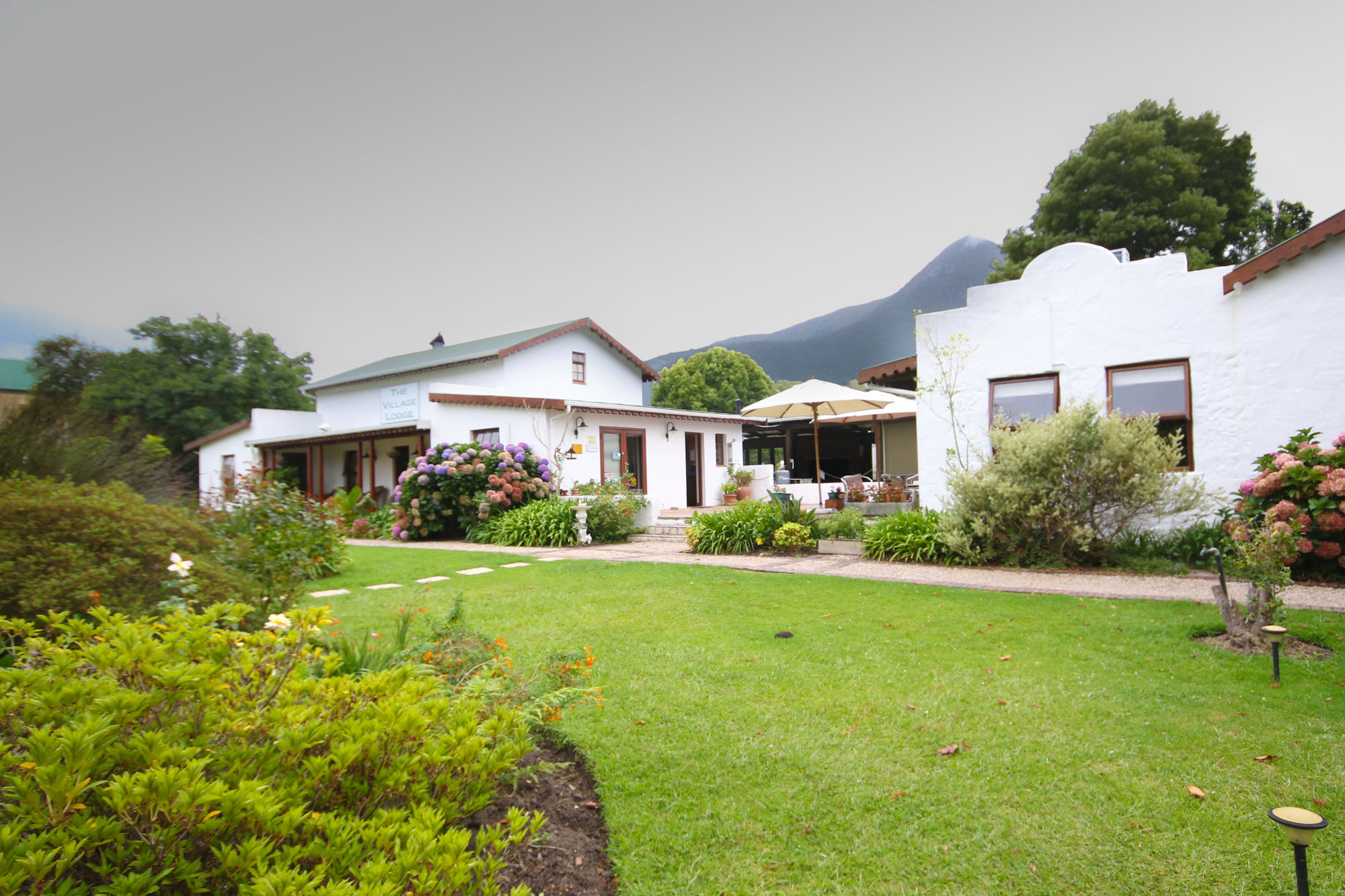 The Village Lodge Stormsrivier Bagian luar foto